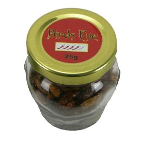 Bird's eye whole chillies in a glass jar
